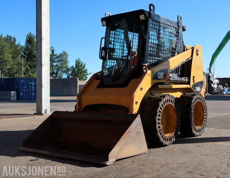 2007 Cat 216B2 Kompaktlaster / Sertifisert / Skuffe - Mini krautuvas: foto 1 2007 Cat 216B2 Kompaktlaster / Sertifisert / Skuffe - Mini krautuvas: foto 1