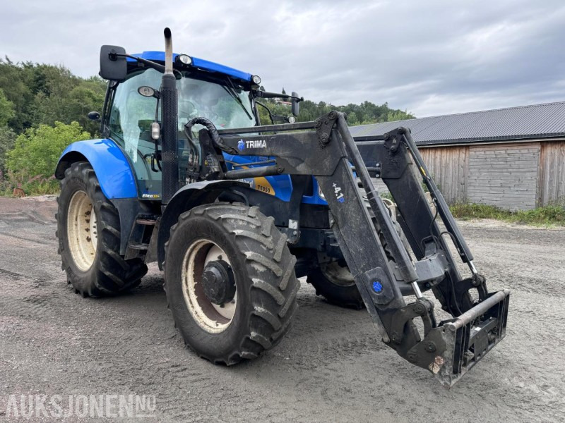 2012 New Holland T6050 med Trima +4.1P frontlaster og panser beskytter - 40 km/t - Traktorius: foto 3 2012 New Holland T6050 med Trima +4.1P frontlaster og panser beskytter - 40 km/t - Traktorius: foto 3