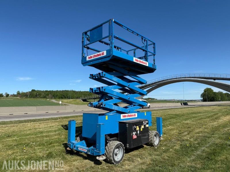 2015 Genie 4069 BE Hybrid terreng sakselift, årskontroll, merkefrie hjul - Kėlimo platforma: foto 1 2015 Genie 4069 BE Hybrid terreng sakselift, årskontroll, merkefrie hjul - Kėlimo platforma: foto 1