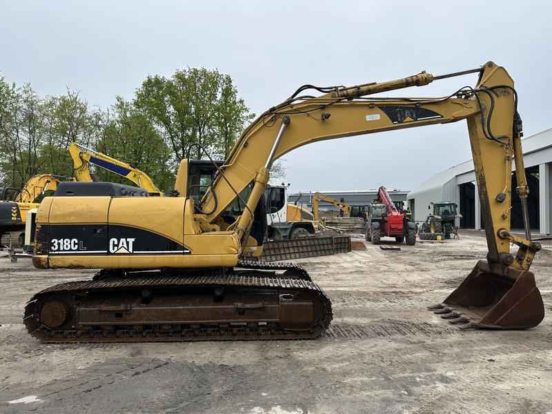 Caterpillar 318 CL (not 320CL - 325CL) - Vikšrinis ekskavatorius: foto 4 Caterpillar 318 CL (not 320CL - 325CL) - Vikšrinis ekskavatorius: foto 4