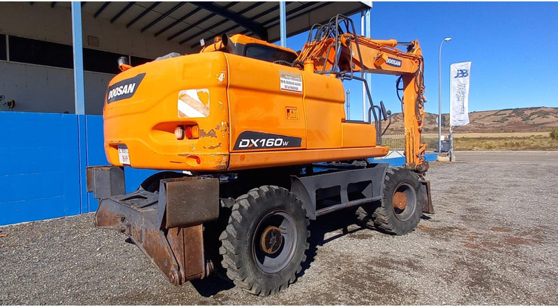 Doosan DX140W-3 - Ratinis ekskavatorius: foto 4 Doosan DX140W-3 - Ratinis ekskavatorius: foto 4