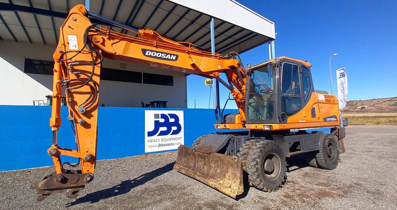 Doosan DX140W-3 - Ratinis ekskavatorius: foto 5 Doosan DX140W-3 - Ratinis ekskavatorius: foto 5
