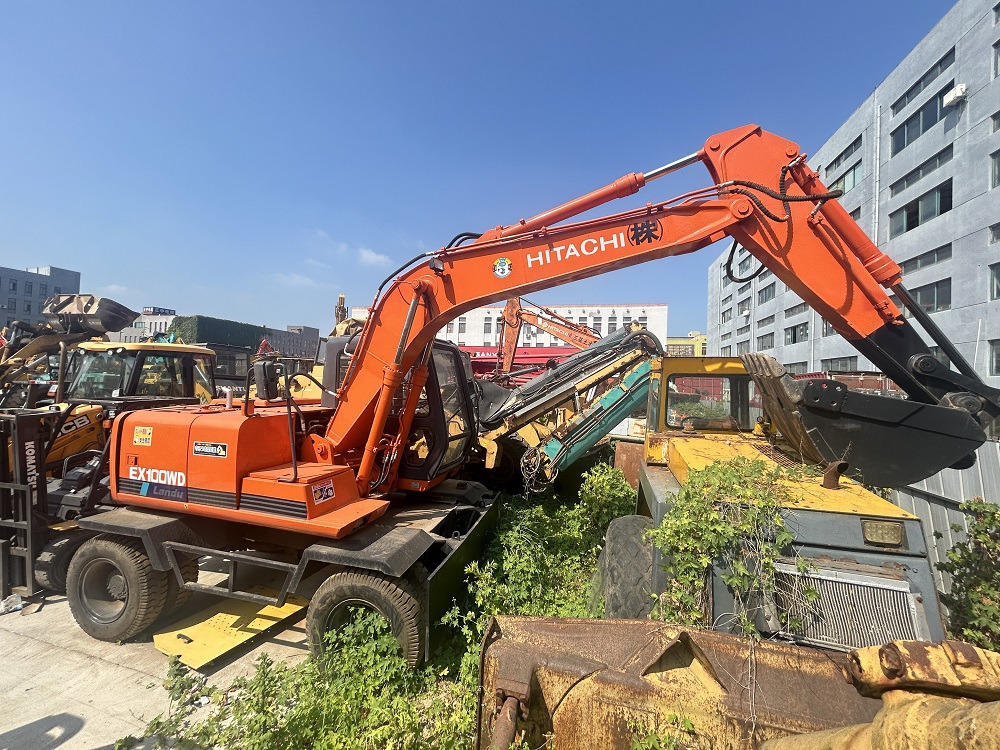 HITACHI Hitachi EX100WD wheel excavator - Ratinis ekskavatorius: foto 1 HITACHI Hitachi EX100WD wheel excavator - Ratinis ekskavatorius: foto 1