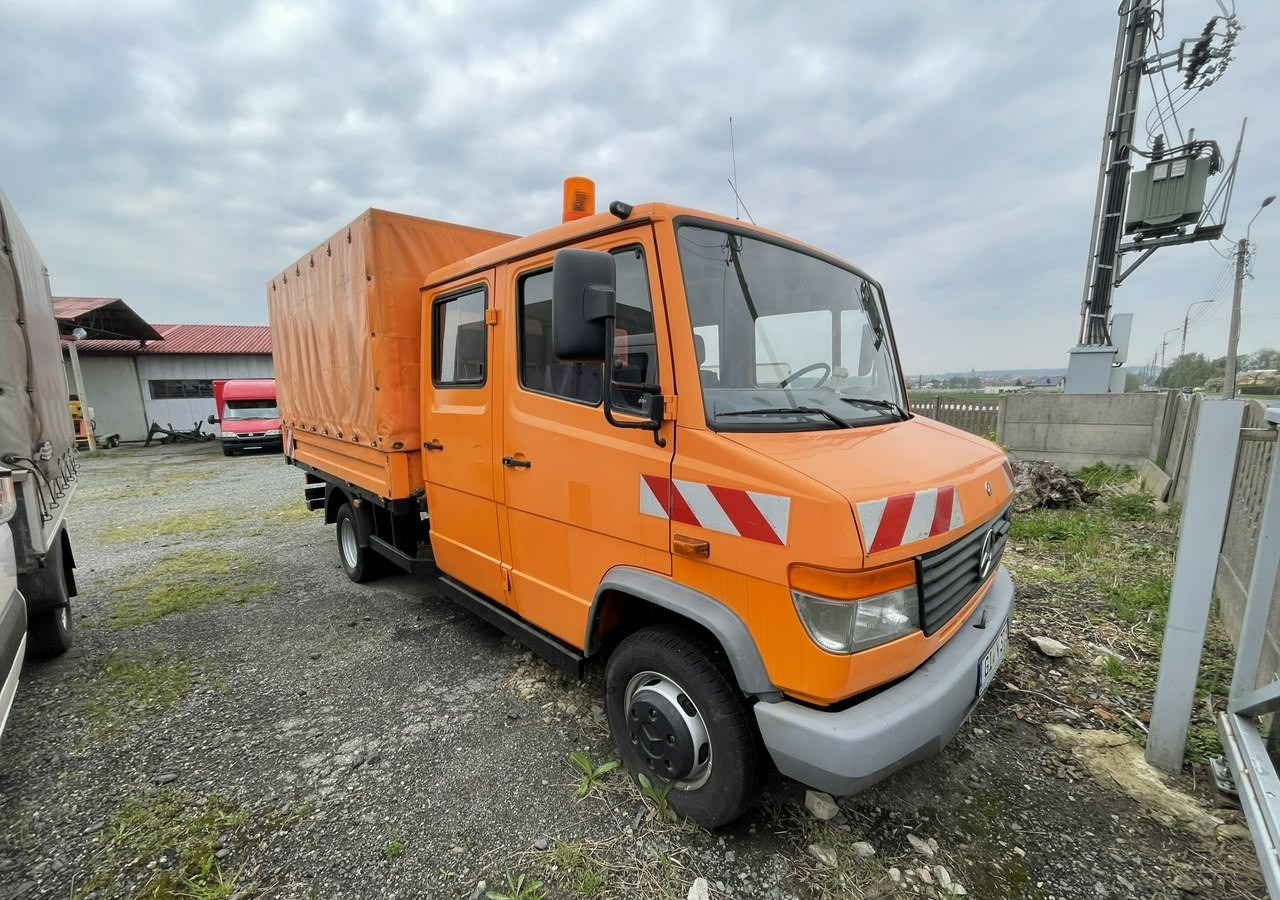 Mercedes-Benz Inny Mercedes-Benz Vario 614 Brygadówka skrzynia plandeka 6-oso doka dokka 2004 - Tentinis sunkvežimis: foto 1 Mercedes-Benz Inny Mercedes-Benz Vario 614 Brygadówka skrzynia plandeka 6-oso doka dokka 2004 - Tentinis sunkvežimis: foto 1