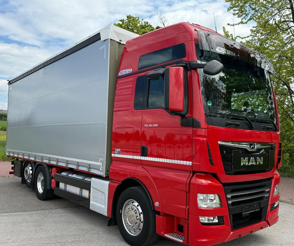 MAN TGX 26.500 / LIFT / 6X2 / KLIMA POSTOJOWA / 18PALET / E6 / FIRANKA / 18 TON ŁADOWNOŚĆ / WINDA / NISKI PRZEBIEG / JEDEN WŁAŚCICIEL / PODWIESZANA OŚ - Tentinis sunkvežimis: foto 2 MAN TGX 26.500 / LIFT / 6X2 / KLIMA POSTOJOWA / 18PALET / E6 / FIRANKA / 18 TON ŁADOWNOŚĆ / WINDA / NISKI PRZEBIEG / JEDEN WŁAŚCICIEL / PODWIESZANA OŚ - Tentinis sunkvežimis: foto 2