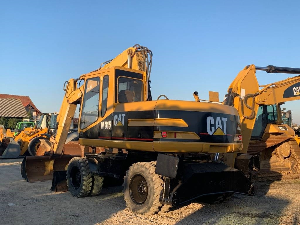 CAT M 315 - Ratinis ekskavatorius: foto 4 CAT M 315 - Ratinis ekskavatorius: foto 4