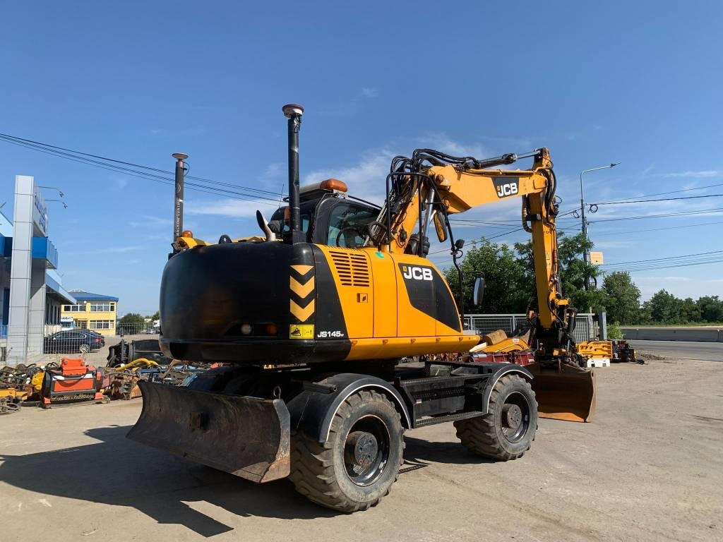 JCB JS 145 W+Engcon Rototilt+Sistem Laser 2D Leica Ico - Ratinis ekskavatorius: foto 4 JCB JS 145 W+Engcon Rototilt+Sistem Laser 2D Leica Ico - Ratinis ekskavatorius: foto 4