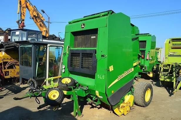 John Deere 592 - Ruloninis presas: foto 1 John Deere 592 - Ruloninis presas: foto 1