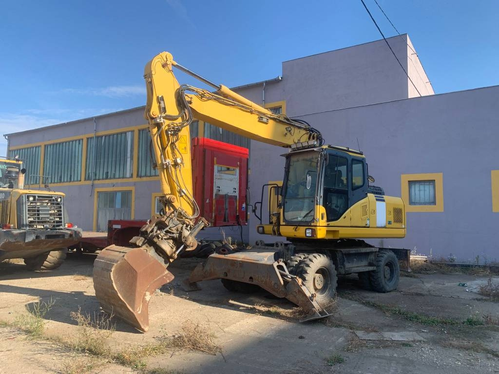 Komatsu PW180-E0+Engcon Rototilt - Ratinis ekskavatorius: foto 1 Komatsu PW180-E0+Engcon Rototilt - Ratinis ekskavatorius: foto 1