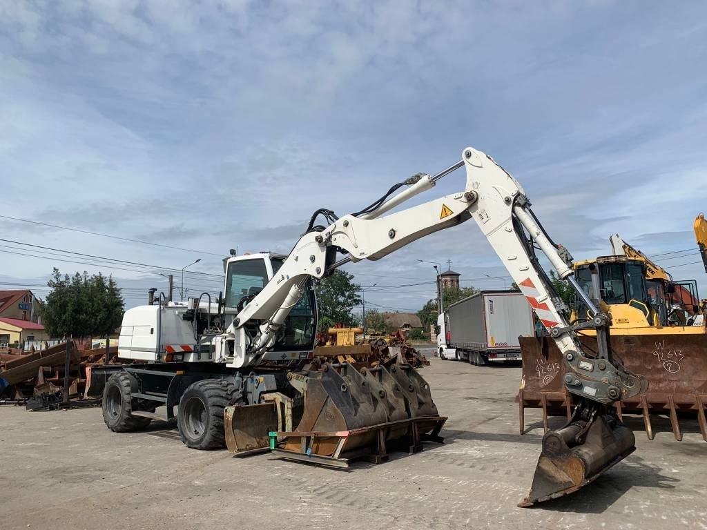 Liebherr A 311 Litronic - Ratinis ekskavatorius: foto 2 Liebherr A 311 Litronic - Ratinis ekskavatorius: foto 2