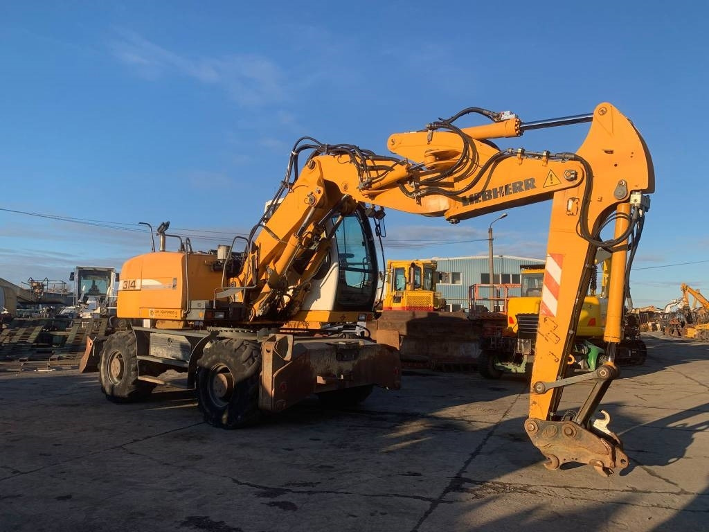 Liebherr A 314 Litronic - Ratinis ekskavatorius: foto 5 Liebherr A 314 Litronic - Ratinis ekskavatorius: foto 5