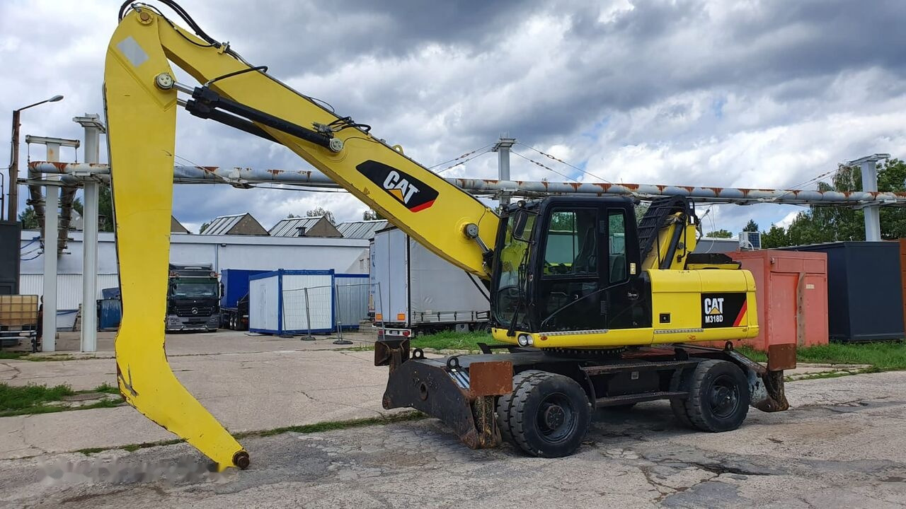 Caterpillar M 318 D MH - Ekskavatorius su ilga strėle: foto 2 Caterpillar M 318 D MH - Ekskavatorius su ilga strėle: foto 2