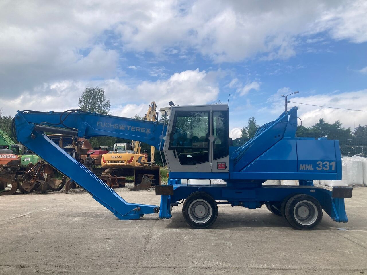 Fuchs MHL 331 C with Generator - Ekskavatorius su ilga strėle: foto 1 Fuchs MHL 331 C with Generator - Ekskavatorius su ilga strėle: foto 1