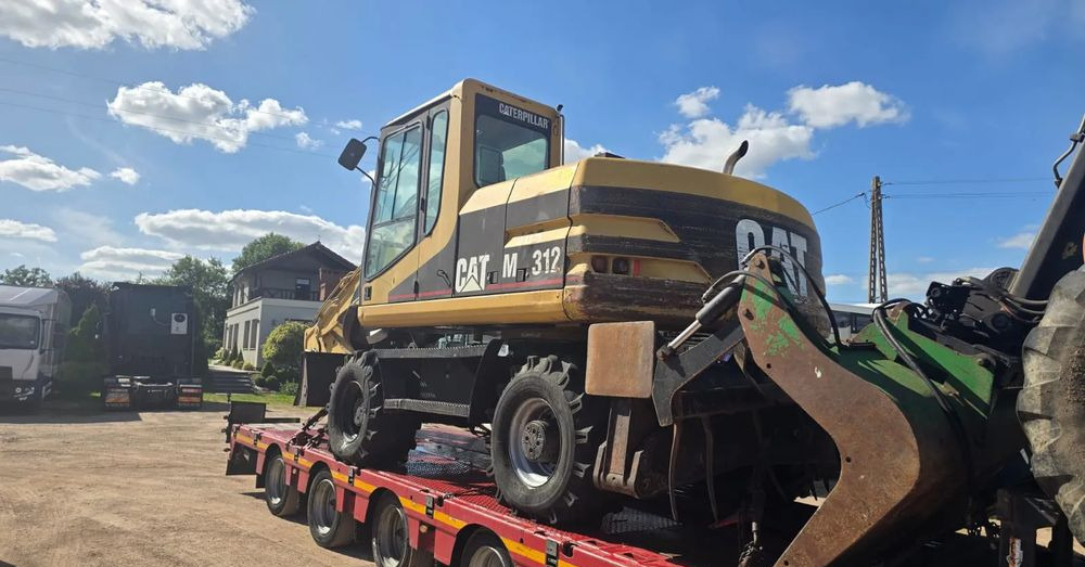 Caterpillar M312 - Ratinis ekskavatorius: foto 4 Caterpillar M312 - Ratinis ekskavatorius: foto 4