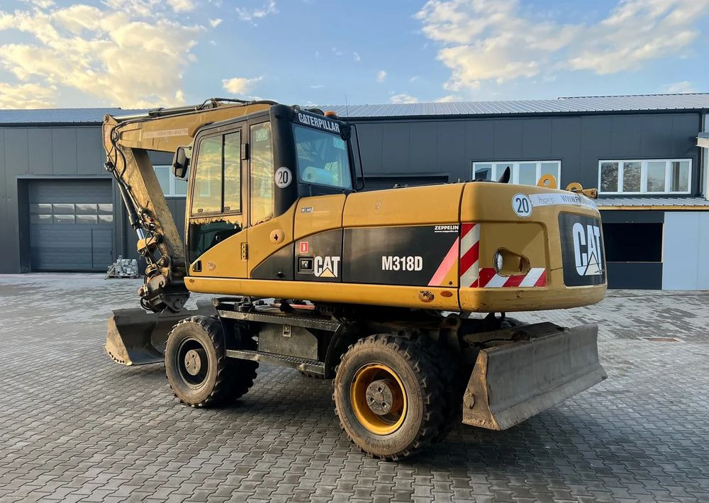 CAT Caterpillar M318D - Ratinis ekskavatorius: foto 4 CAT Caterpillar M318D - Ratinis ekskavatorius: foto 4