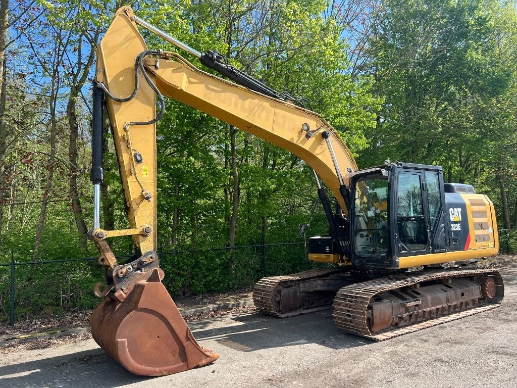 Vikšrinis ekskavatorius CAT 323 E: foto 1