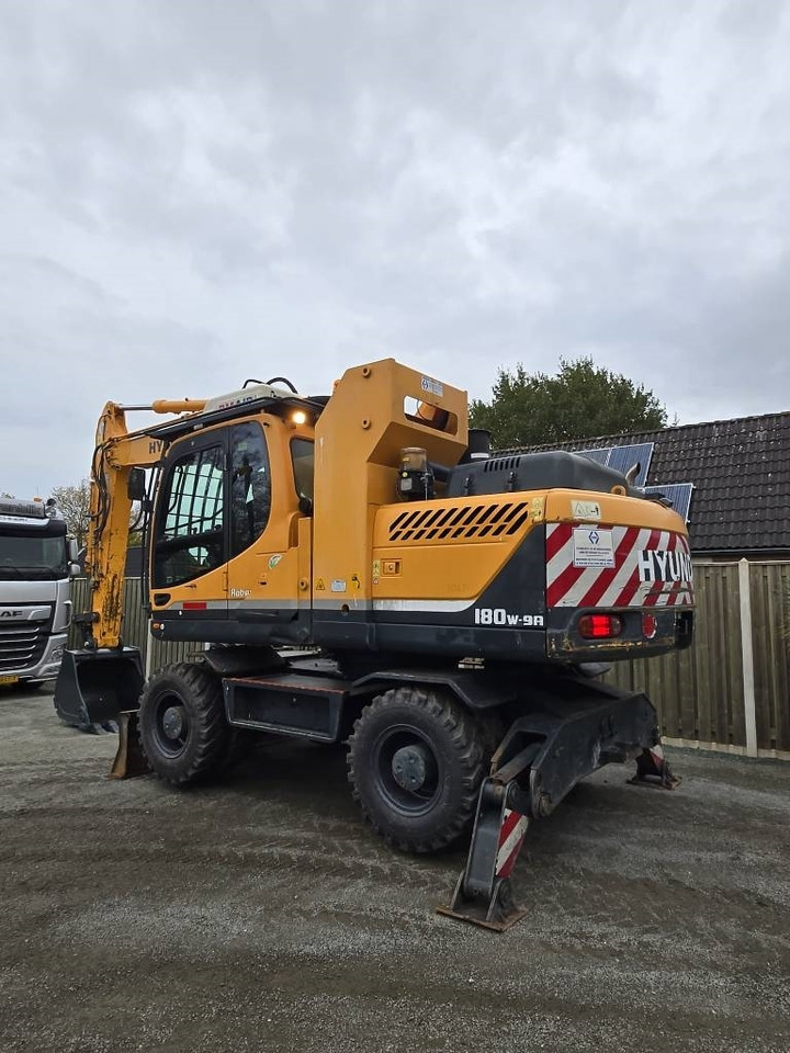 Hyundai R 180W-9A - Ratinis ekskavatorius: foto 2 Hyundai R 180W-9A - Ratinis ekskavatorius: foto 2