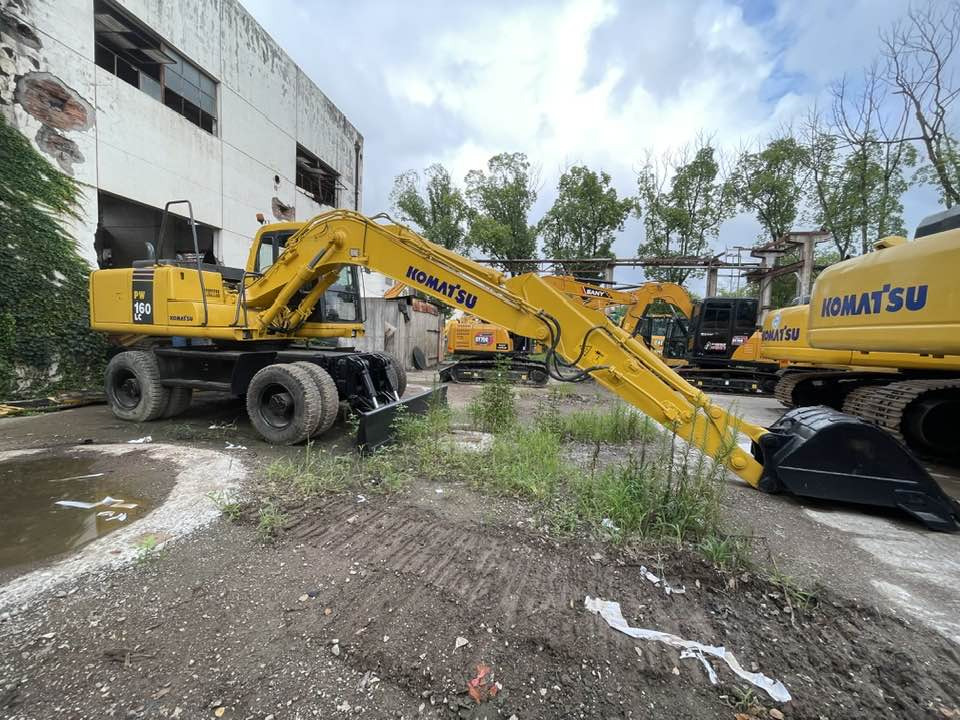 Ratinis ekskavatorius Komatsu PC160LC: foto 20