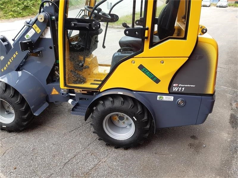Eurotrac W11 med lang arm, førerhus, skovl og gafler - Šarnyrinis krautuvas: foto 5 Eurotrac W11 med lang arm, førerhus, skovl og gafler - Šarnyrinis krautuvas: foto 5