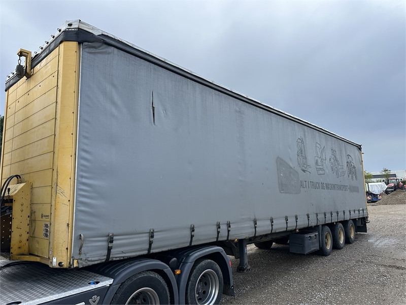 Schmitz Cargobull Machine transport trailer with bag ramp - Žemo profilio platforma puspriekabė: foto 4 Schmitz Cargobull Machine transport trailer with bag ramp - Žemo profilio platforma puspriekabė: foto 4