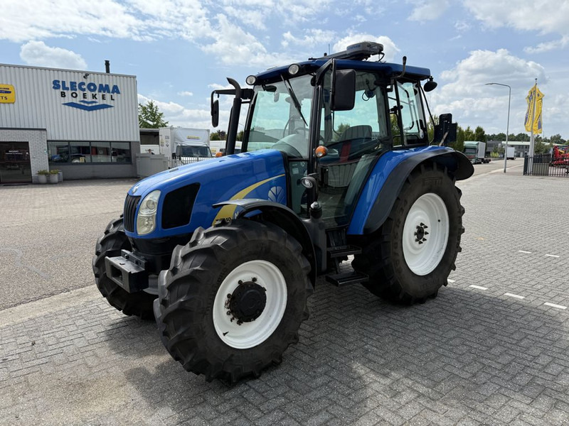 New Holland T5040 CAB + GPS - Traktorius: foto 1 New Holland T5040 CAB + GPS - Traktorius: foto 1