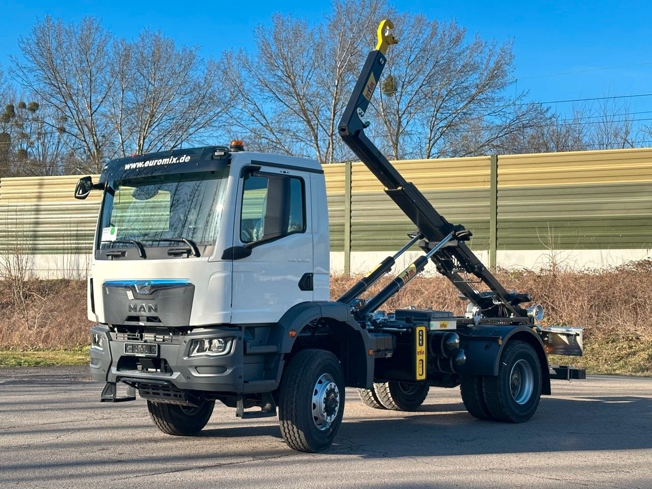 MAN TGM 18.320 4x4 Euro 6e Hyva 12-45 - Hook-lift sunkvežimis, Sunkvežimis su kranu: foto 1 MAN TGM 18.320 4x4 Euro 6e Hyva 12-45 - Hook-lift sunkvežimis, Sunkvežimis su kranu: foto 1