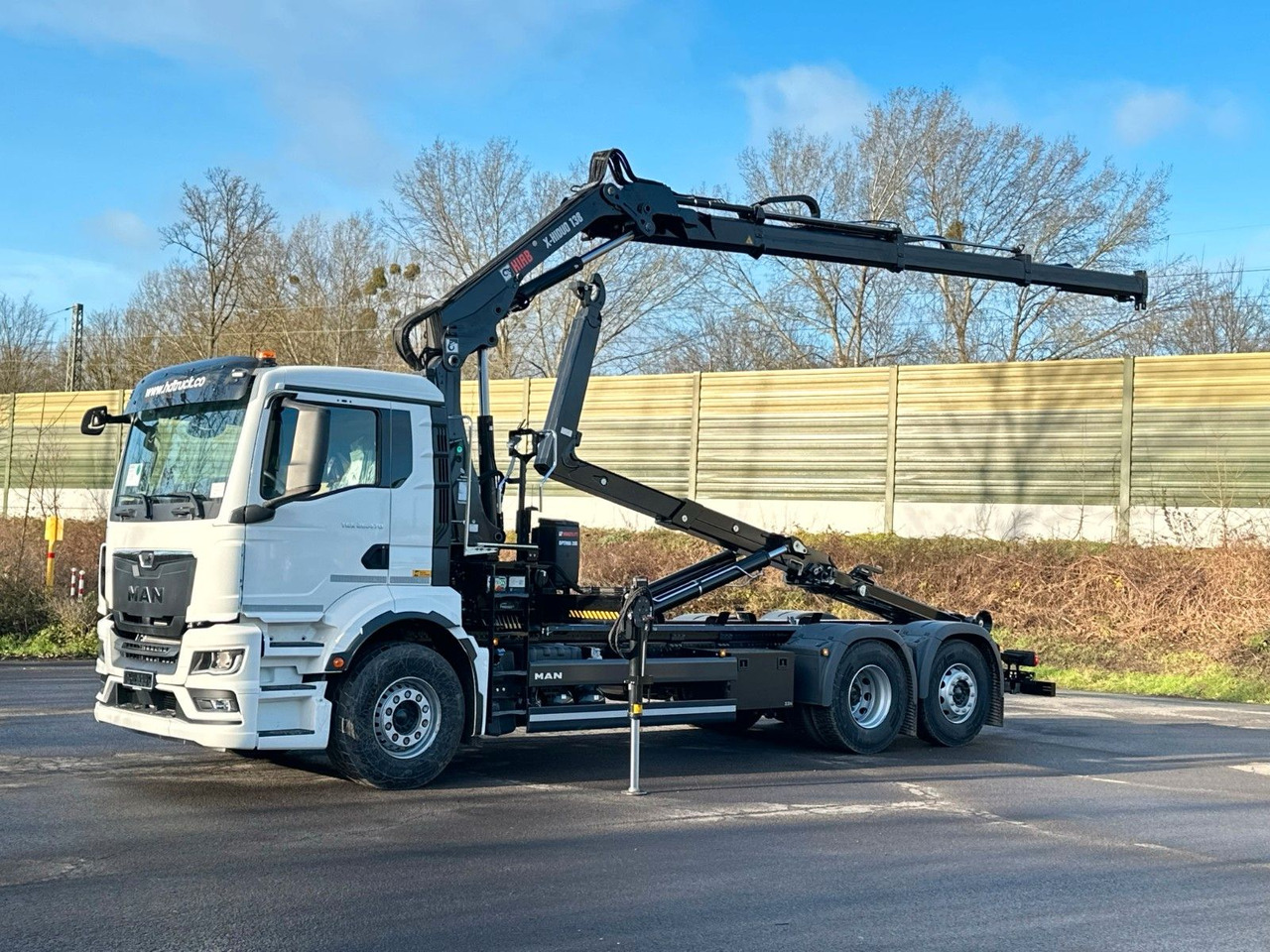 MAN TGS 26.470 6x2 Abrollkipper + Kran Hiab 138-3 - Hook-lift sunkvežimis, Sunkvežimis su kranu: foto 1 MAN TGS 26.470 6x2 Abrollkipper + Kran Hiab 138-3 - Hook-lift sunkvežimis, Sunkvežimis su kranu: foto 1