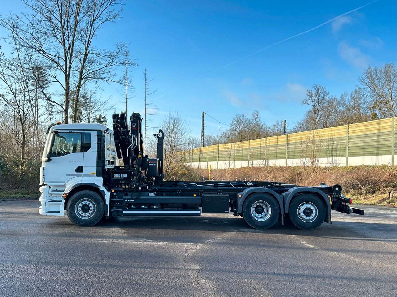 MAN TGS 26.470 6x2 Abrollkipper + Kran Hiab 138-3 - Hook-lift sunkvežimis, Sunkvežimis su kranu: foto 3 MAN TGS 26.470 6x2 Abrollkipper + Kran Hiab 138-3 - Hook-lift sunkvežimis, Sunkvežimis su kranu: foto 3