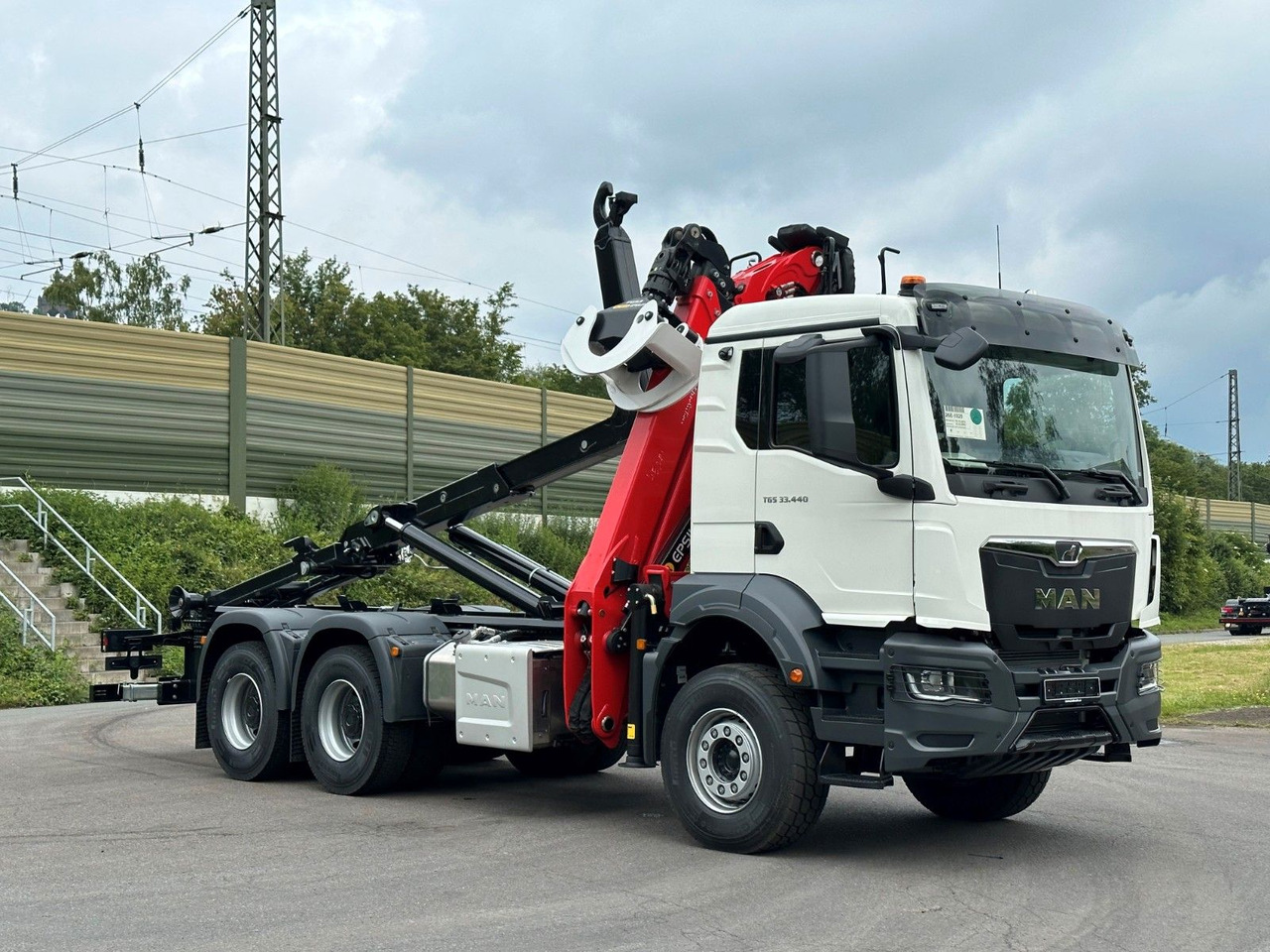 MAN TGS 33.440 6x4 Epsilon 170Z MultiLift 20s56 - Hook-lift sunkvežimis, Sunkvežimis su kranu: foto 1 MAN TGS 33.440 6x4 Epsilon 170Z MultiLift 20s56 - Hook-lift sunkvežimis, Sunkvežimis su kranu: foto 1