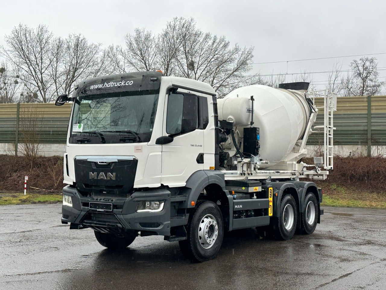 MAN TGS 33.440 6x4 Euro6e Abroller + Fahrmischer - Hook-lift sunkvežimis, Sunkvežimis su kranu: foto 2 MAN TGS 33.440 6x4 Euro6e Abroller + Fahrmischer - Hook-lift sunkvežimis, Sunkvežimis su kranu: foto 2