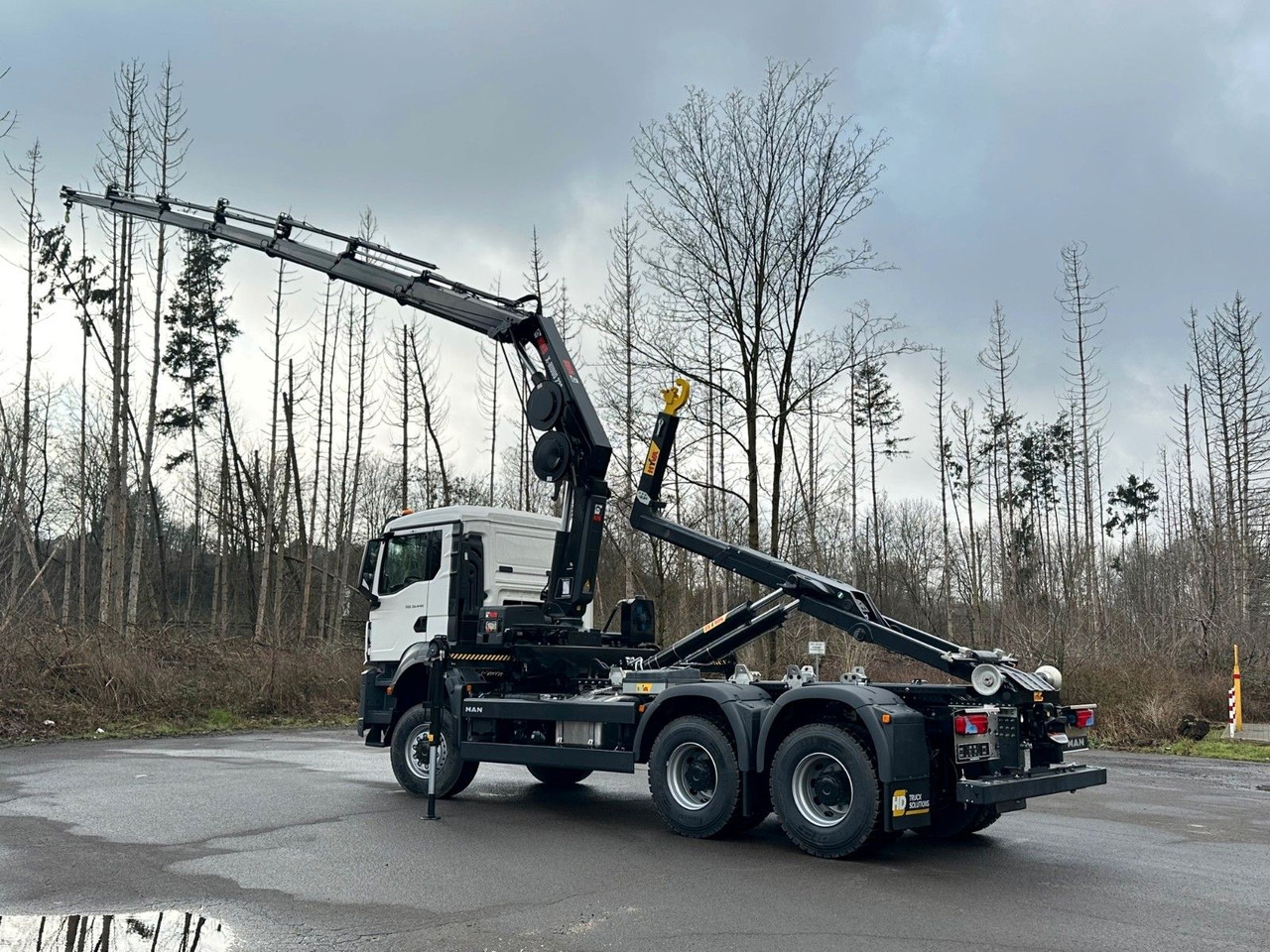 MAN TGS 33.440 6x6 BB Abrollkipper+Kran Hiab 228-6 - Hook-lift sunkvežimis, Sunkvežimis su kranu: foto 5 MAN TGS 33.440 6x6 BB Abrollkipper+Kran Hiab 228-6 - Hook-lift sunkvežimis, Sunkvežimis su kranu: foto 5