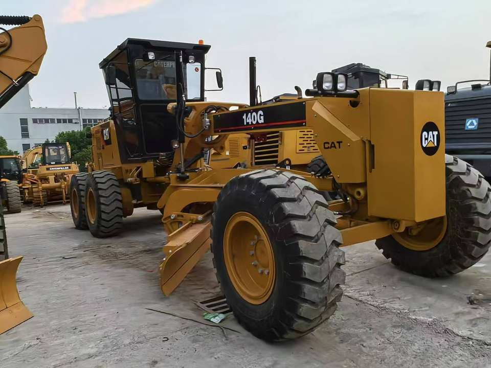Second Hand Used Construction Machinery Japanese CAT 140G Grader Caterpillar Brand for Sale With Good Condition and Price - Greideris: foto 4 Second Hand Used Construction Machinery Japanese CAT 140G Grader Caterpillar Brand for Sale With Good Condition and Price - Greideris: foto 4