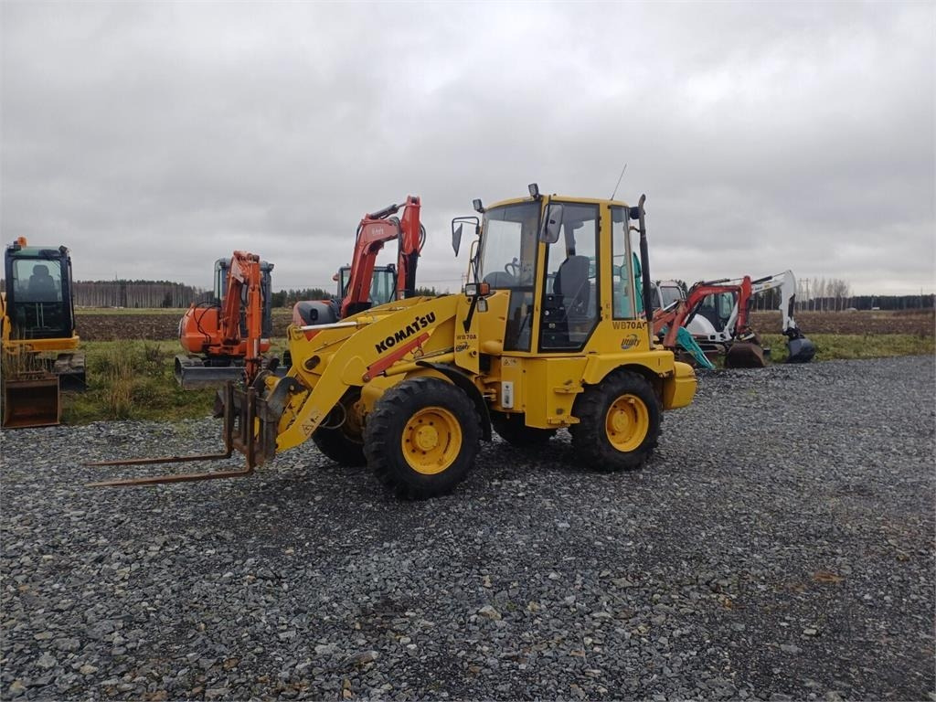 Komatsu WB70A Pyöräkuormaaja - Ratinis krautuvas: foto 1 Komatsu WB70A Pyöräkuormaaja - Ratinis krautuvas: foto 1