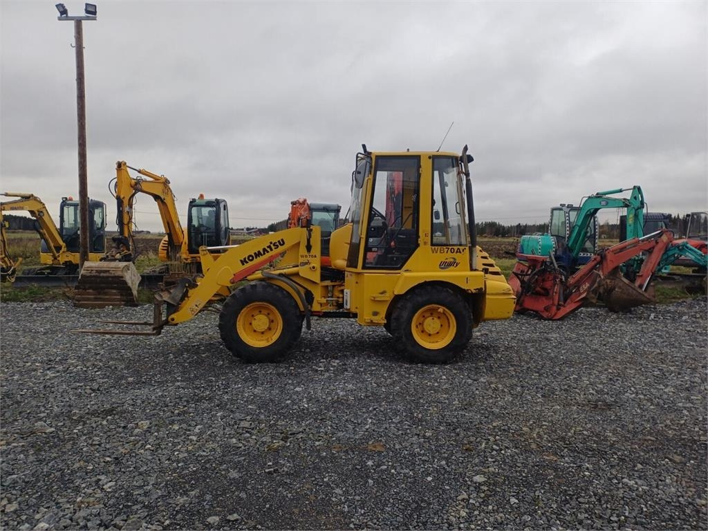 Komatsu WB70A Pyöräkuormaaja - Ratinis krautuvas: foto 2 Komatsu WB70A Pyöräkuormaaja - Ratinis krautuvas: foto 2