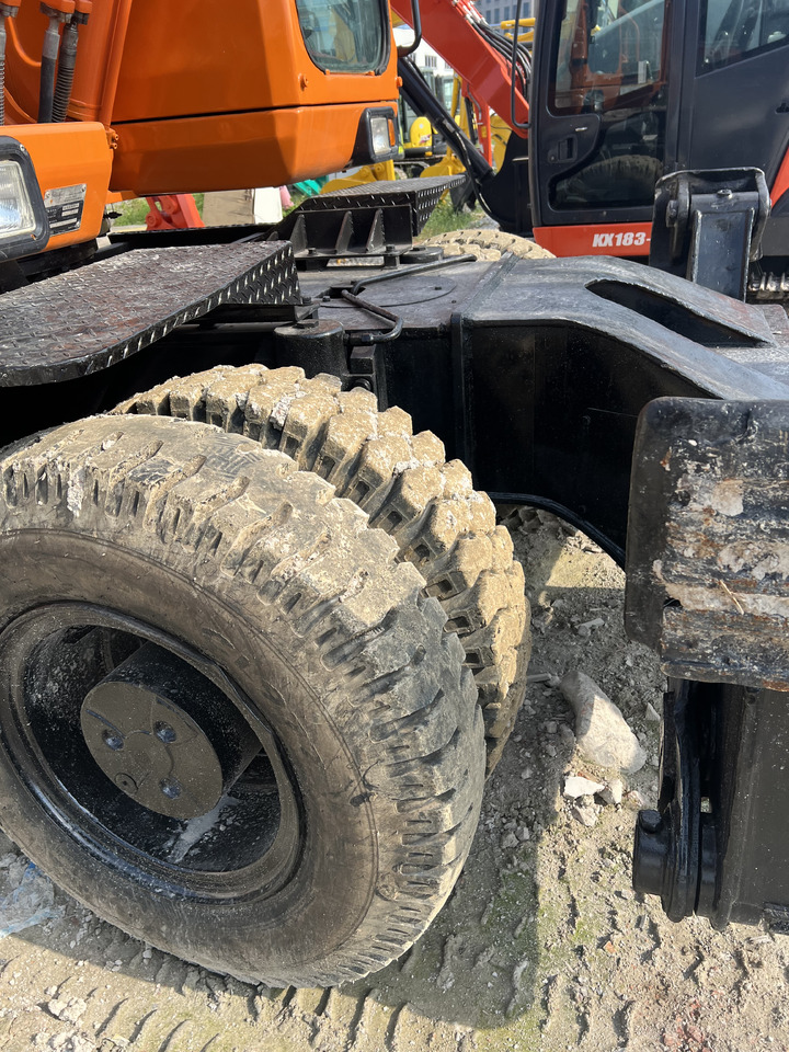 Ratinis ekskavatorius DOOSAN DX210: foto 10 Ratinis ekskavatorius DOOSAN DX210: foto 10