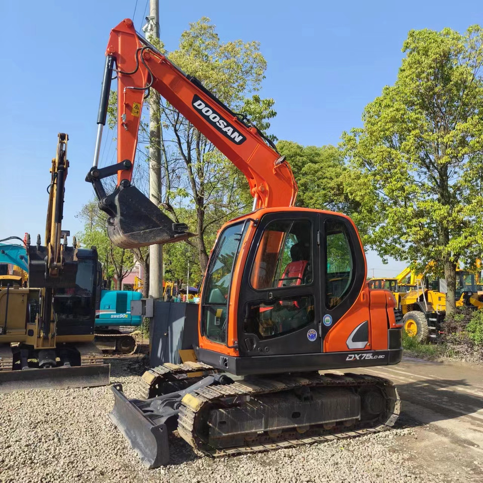 DOOSAN DX75 - Vikšrinis ekskavatorius: foto 1 DOOSAN DX75 - Vikšrinis ekskavatorius: foto 1