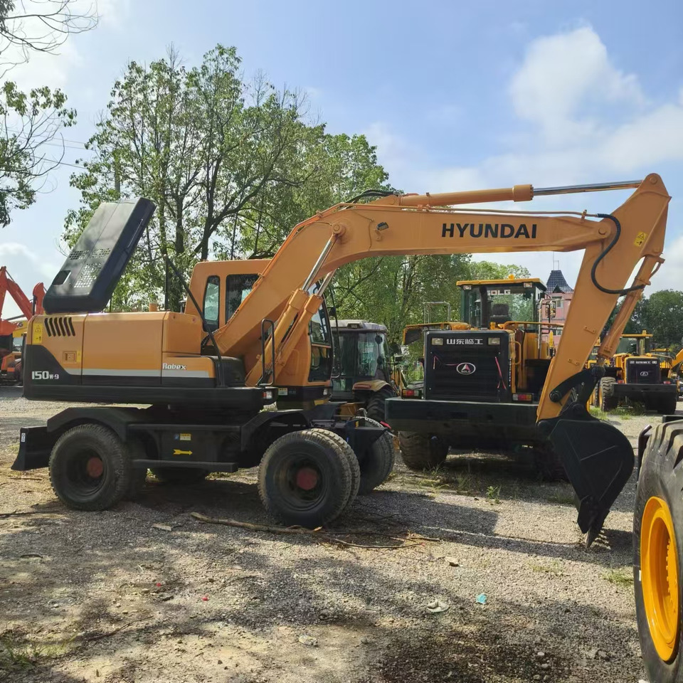 Hyundai R150W-7 - Ratinis ekskavatorius: foto 1 Hyundai R150W-7 - Ratinis ekskavatorius: foto 1