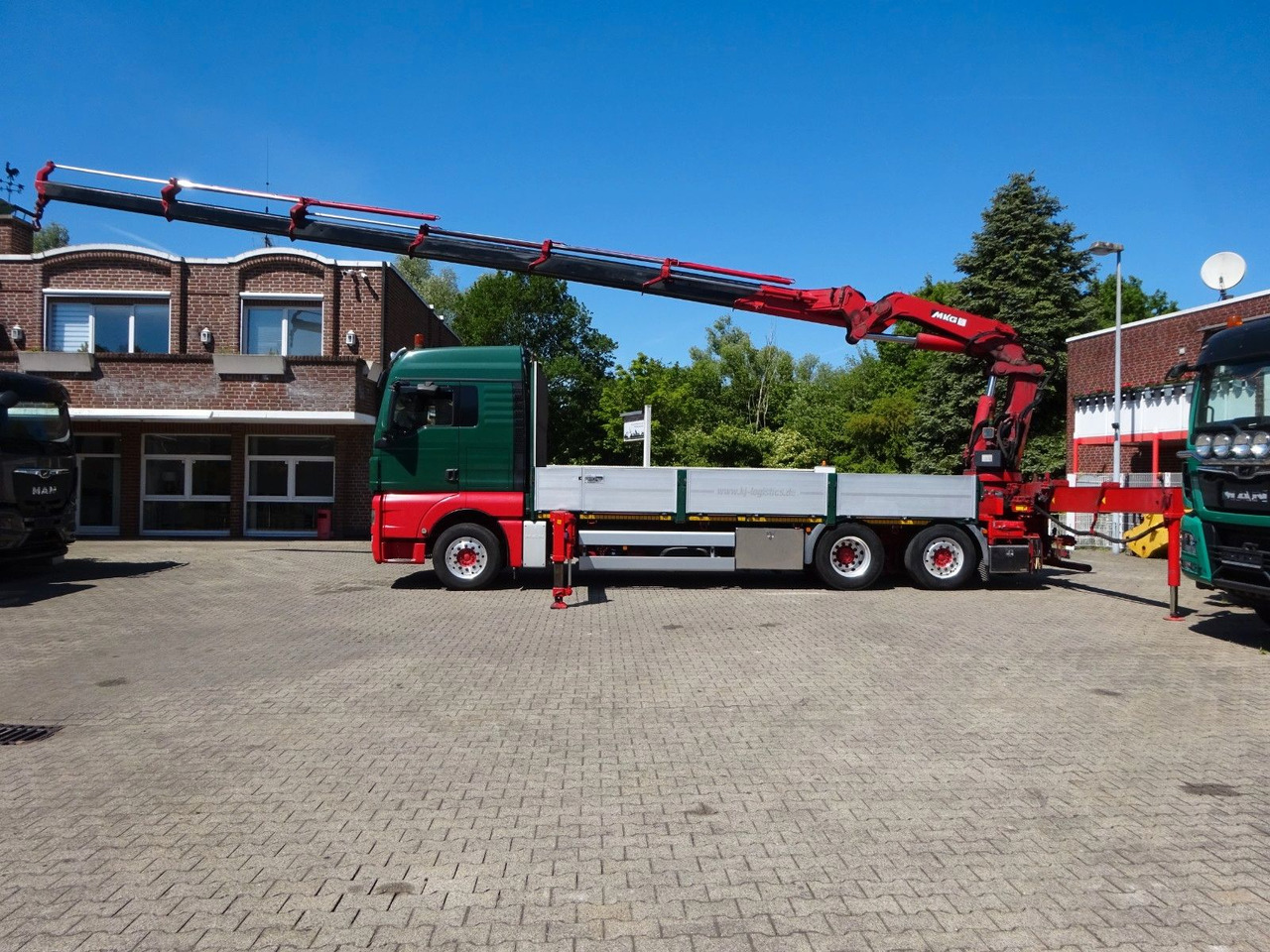 MAN 26.480 TGX + MKG HLK531 Kran +Lift-Lenkachse - Platforminis/ Bortinis sunkvežimis, Sunkvežimis su kranu: foto 1 MAN 26.480 TGX + MKG HLK531 Kran +Lift-Lenkachse - Platforminis/ Bortinis sunkvežimis, Sunkvežimis su kranu: foto 1