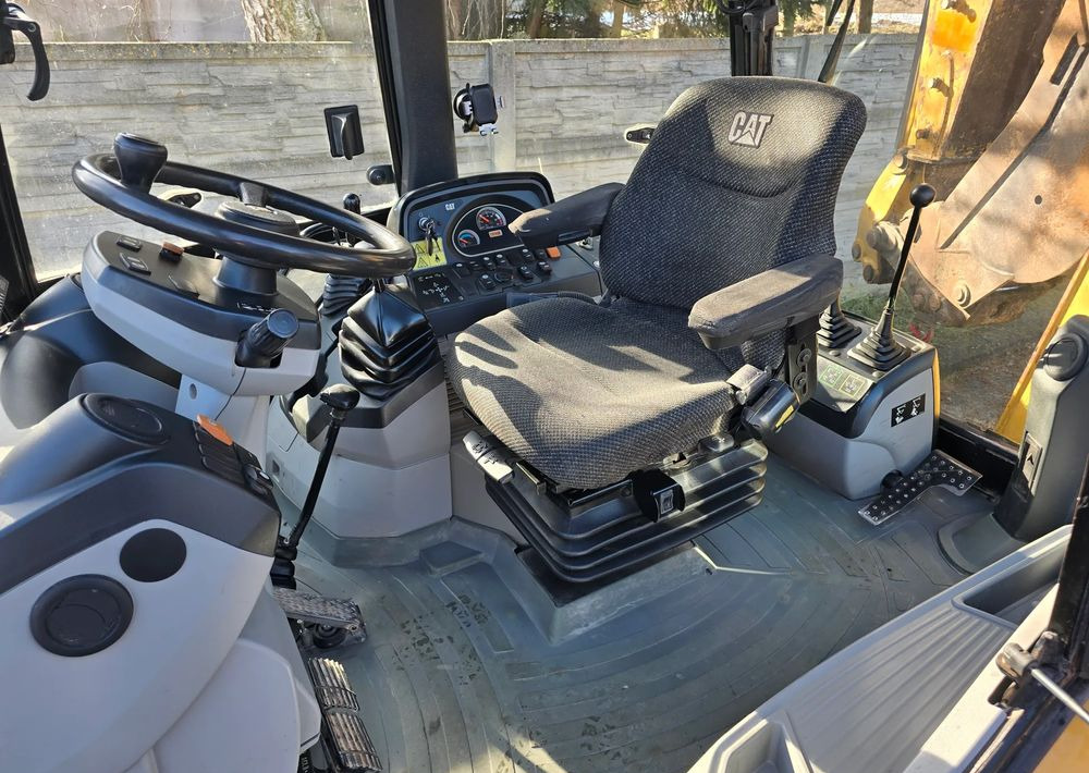 Caterpillar - Ekskavatorius-krautuvas: foto 3 Caterpillar - Ekskavatorius-krautuvas: foto 3