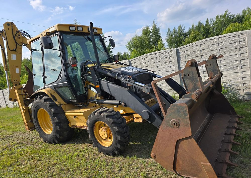 Caterpillar - Ekskavatorius-krautuvas: foto 3 Caterpillar - Ekskavatorius-krautuvas: foto 3