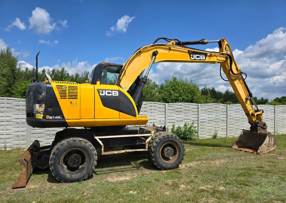 JCB - Ratinis ekskavatorius: foto 2 JCB - Ratinis ekskavatorius: foto 2