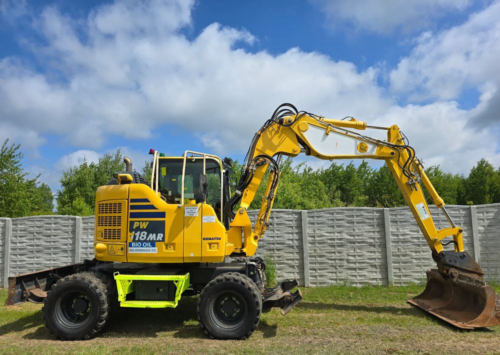 Komatsu - Ratinis ekskavatorius: foto 1 Komatsu - Ratinis ekskavatorius: foto 1