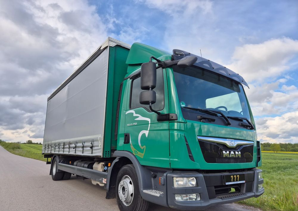 MAN TGL 12.250 6.2m AUTOMAT KLIMA z Niemiec ESP nowe opony EURO 6 / 4.75 rozstaw / zawiesie na wózek widłowy / TOP STAN / okazja nauka jazdy MOŻLIWOŚĆ DOSTOSOWANIA 12t - Tentinis sunkvežimis: foto 1 MAN TGL 12.250 6.2m AUTOMAT KLIMA z Niemiec ESP nowe opony EURO 6 / 4.75 rozstaw / zawiesie na wózek widłowy / TOP STAN / okazja nauka jazdy MOŻLIWOŚĆ DOSTOSOWANIA 12t - Tentinis sunkvežimis: foto 1