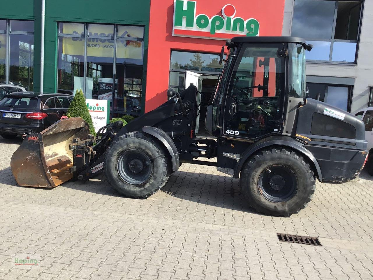 JCB 409 - Ratinis krautuvas: foto 1 JCB 409 - Ratinis krautuvas: foto 1