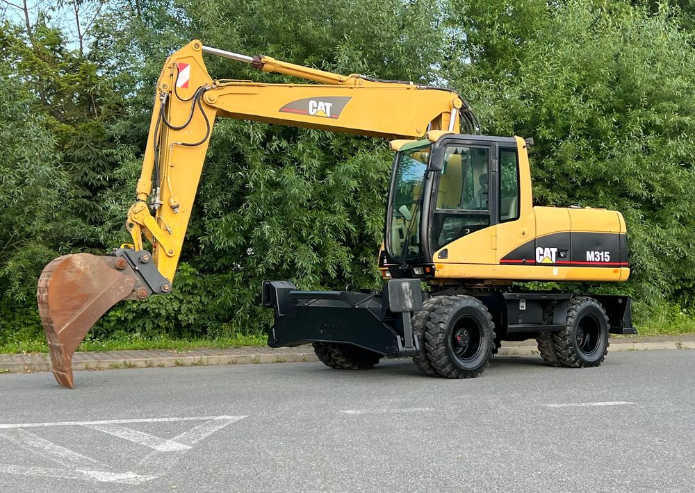 Caterpillar CAT M315C CATERPILLAR SPROWADZONY Bardzo Dobry Stan - Ratinis ekskavatorius: foto 1 Caterpillar CAT M315C CATERPILLAR SPROWADZONY Bardzo Dobry Stan - Ratinis ekskavatorius: foto 1