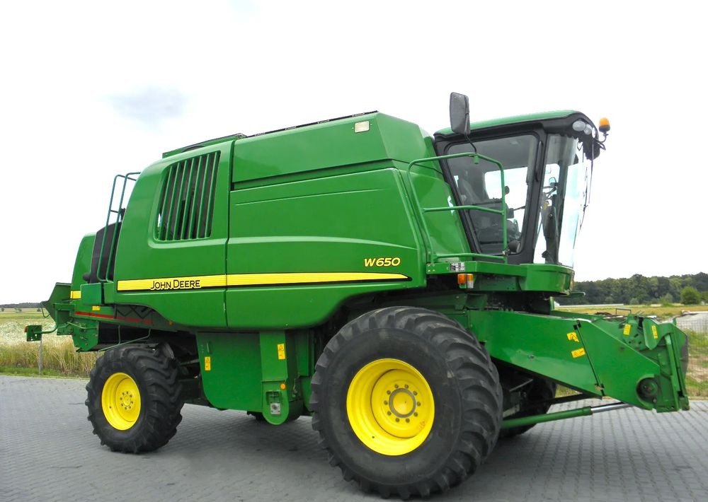 John Deere W650 2008 Rok, heder 6,7m, Nie Malowany, Stan Bardzo Dobry - Derliaus nuėmimo kombainas: foto 2 John Deere W650 2008 Rok, heder 6,7m, Nie Malowany, Stan Bardzo Dobry - Derliaus nuėmimo kombainas: foto 2