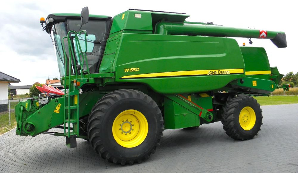 John Deere W650 2008 Rok, heder 6,7m, Nie Malowany, Stan Bardzo Dobry - Derliaus nuėmimo kombainas: foto 1 John Deere W650 2008 Rok, heder 6,7m, Nie Malowany, Stan Bardzo Dobry - Derliaus nuėmimo kombainas: foto 1