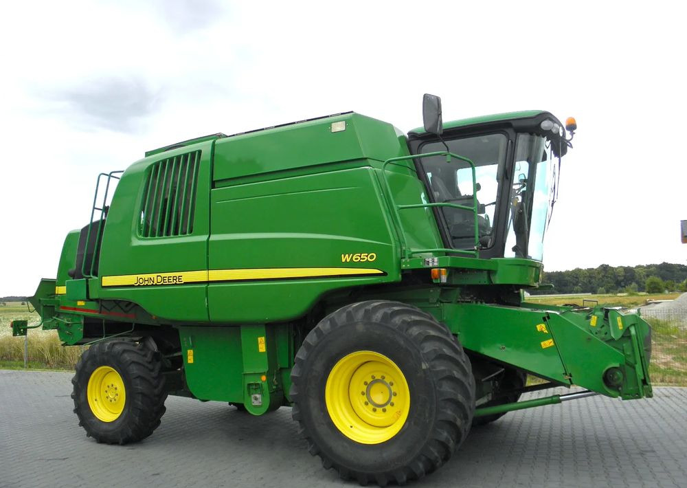 John Deere W650 2008 Rok, heder 6,7m, Nie Malowany, Stan Bardzo Dobry - Derliaus nuėmimo kombainas: foto 4 John Deere W650 2008 Rok, heder 6,7m, Nie Malowany, Stan Bardzo Dobry - Derliaus nuėmimo kombainas: foto 4