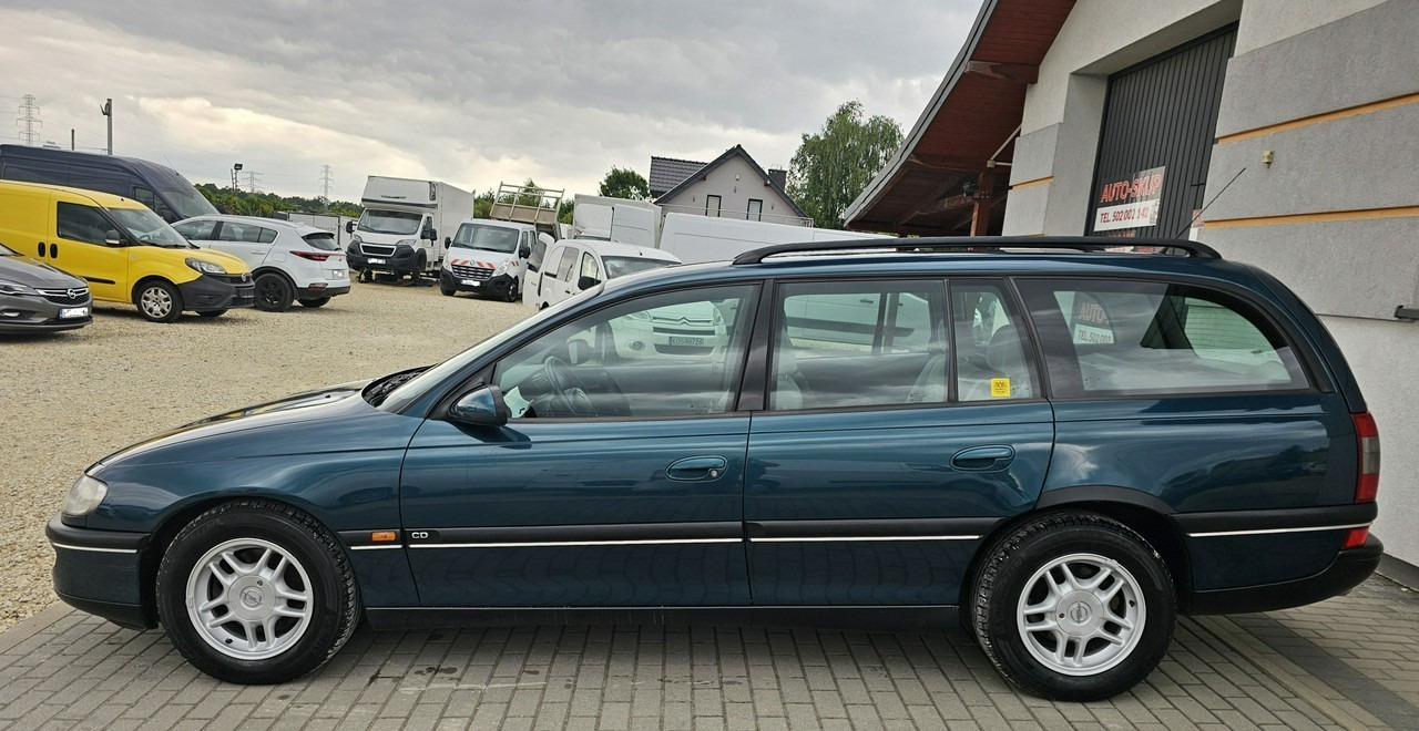 Opel Omega B 2,5 v6 *automat* napęd tył *welury* - Lengvasis automobilis: foto 4 Opel Omega B 2,5 v6 *automat* napęd tył *welury* - Lengvasis automobilis: foto 4