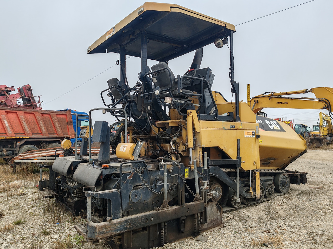 Caterpillar AP555E - Gudronatorius: foto 1 Caterpillar AP555E - Gudronatorius: foto 1